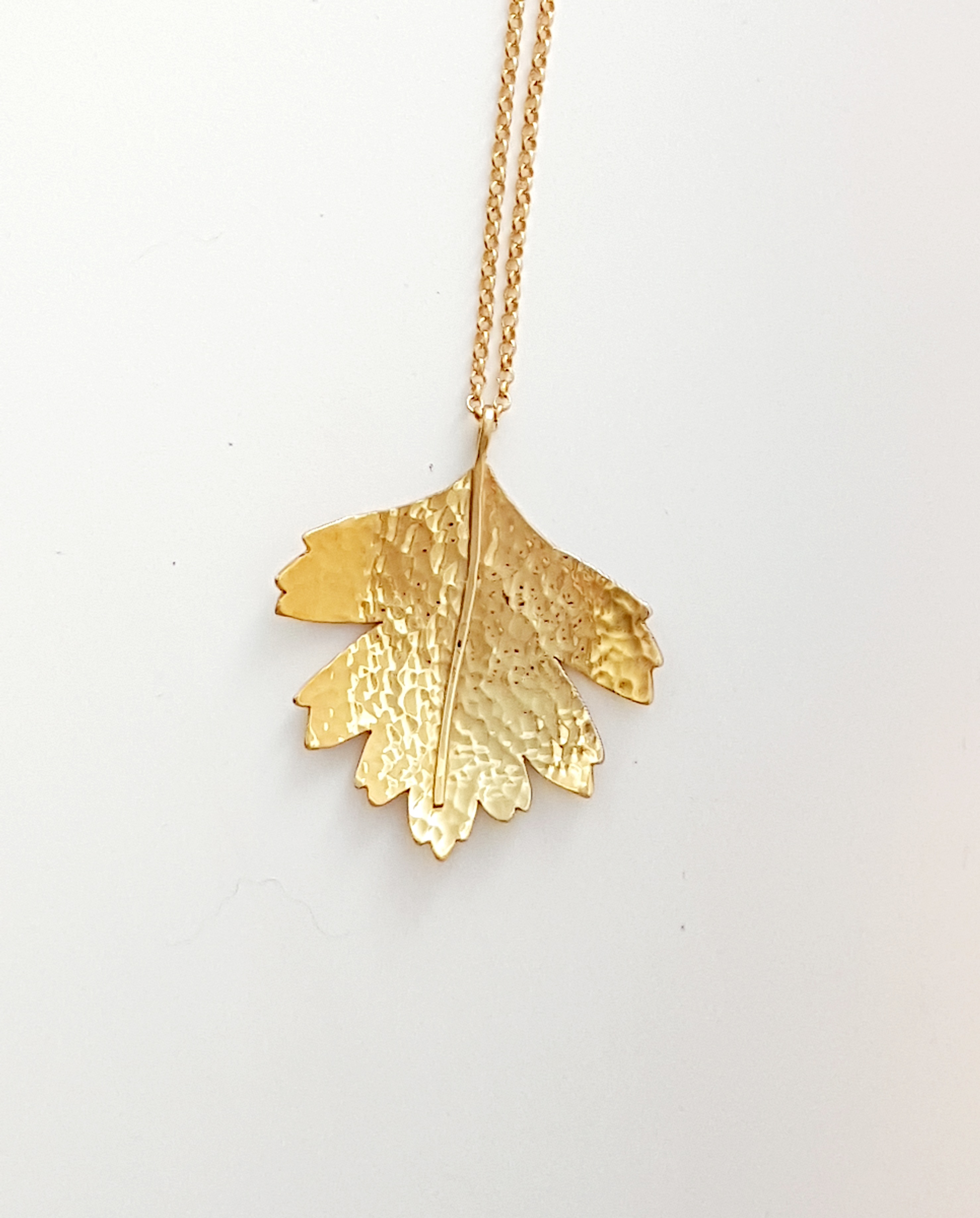 Zoomed out Photo of Gold Hawthorn Leaf Pendant